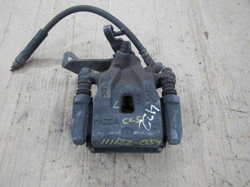 суппорт задний левый Mazda CX-5 1 поколение 2014, 2.0 л., дизель - фото №1