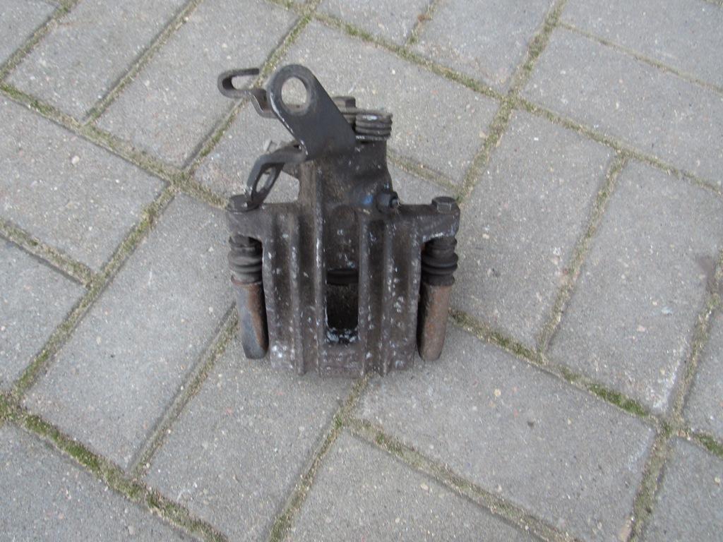 суппорт задний правый Volkswagen Golf 5 поколение 2008 - фото №1