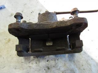 суппорт передний левый Mitsubishi L200 4 поколение 2010