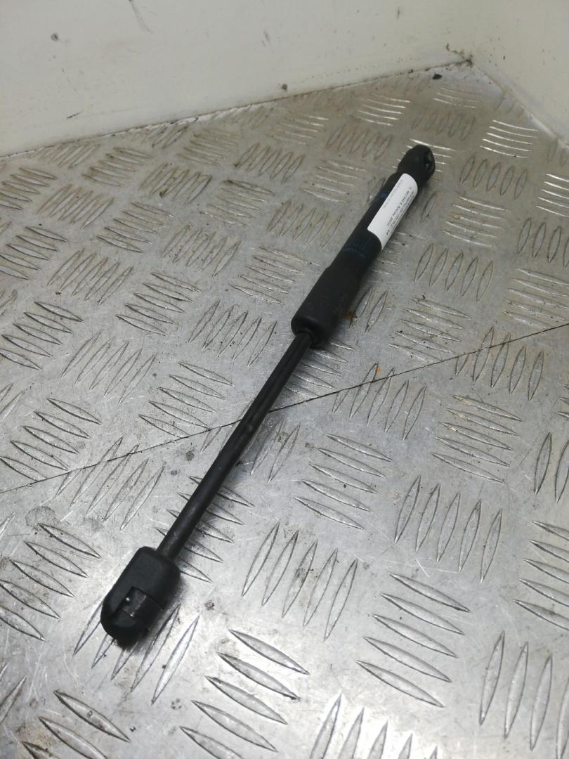 амортизатор капота BMW 5 серия F07/F10/F11 F10 2012, 4.4 л., N63 B44 A, бензин, АКПП, titansilber metallic (354), седан, задний привод, 51237206644, 7206644 - фото №1