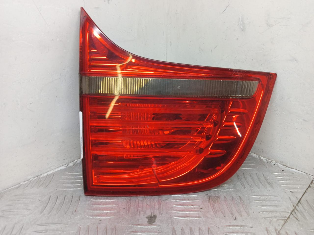 фонарь крышки багажника левый BMW X6 E71/E72 E71 2009, 3.5 л., M57D30 (306D5), дизель, АКПП, monacoblau (a35), внедорожник 5 дв., полный привод, правый руль, 63217179987, 7179987 - фото №1