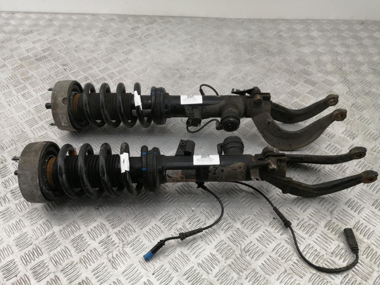 амортизатор передний левый BMW X5 F15 2015, 4.0 л., дизель, АКПП, black sapphire metallic (475), внедорожник 5 дв., полный привод, правый руль, 6875083, 6875084, 31336862235, 6862235 - фото №1