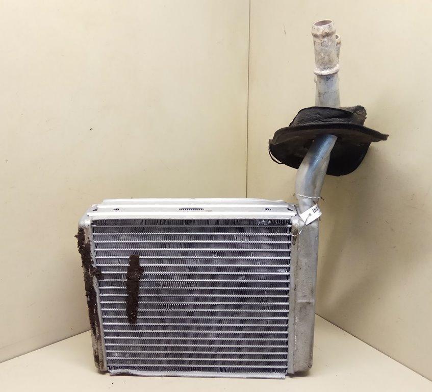 радиатор отопителя (печки) Ford Focus 1 поколение 2000, 2.0 л., i, бензин, МКПП, черный, универсал, передний привод - фото №1