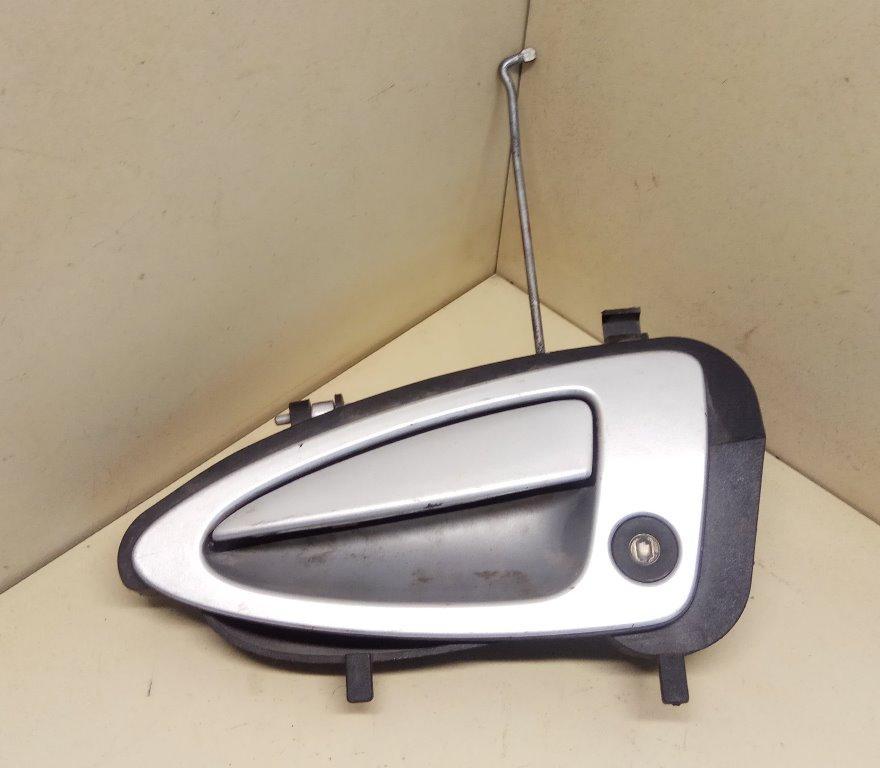 ручка наружная Ford Cougar 1 поколение 1999 - фото №1