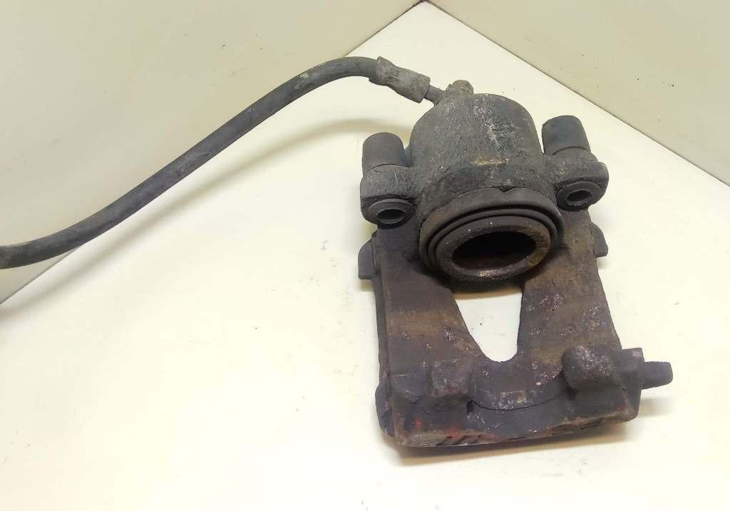 суппорт передний левый Volkswagen Golf 4 поколение 1999, 1.9 л., дизель, 5МКПП, хетчбэк 3 дв. - фото №1