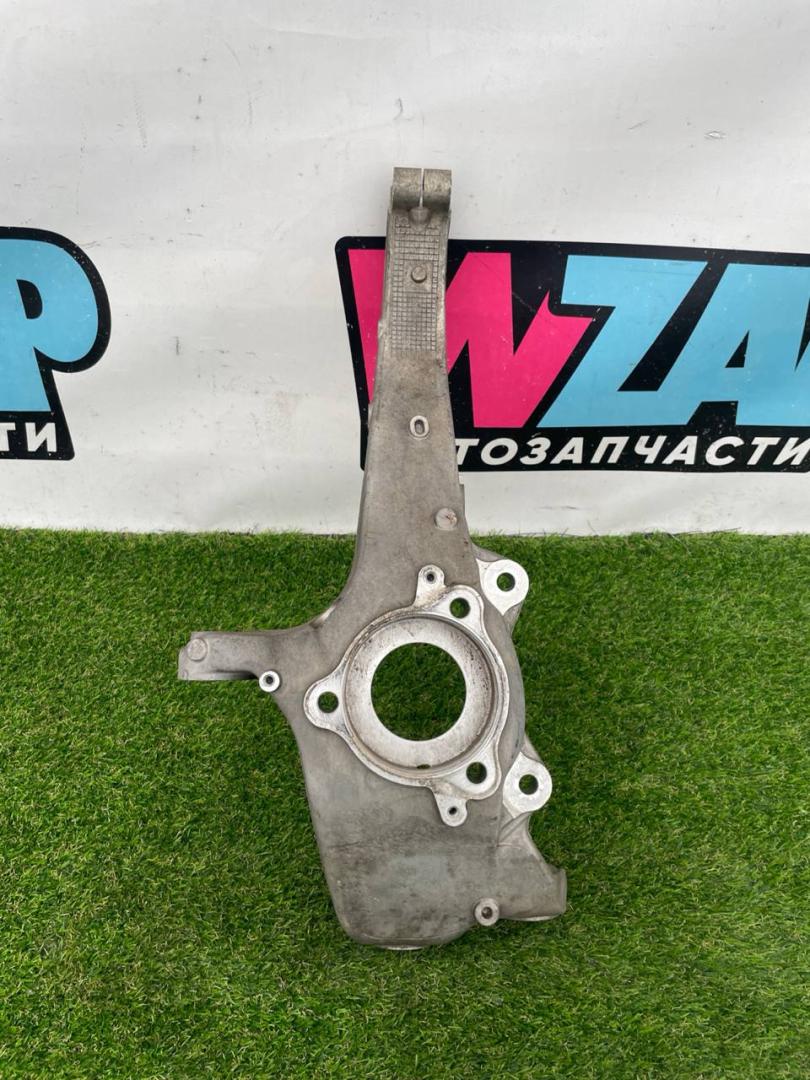 кулак поворотный левый Tesla Model Y 1 поколение 2022, электро, белый, 118831100E - фото №1