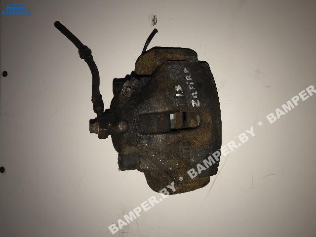 суппорт передний левый Opel Zafira 1 поколение (A) 2002 - фото №1