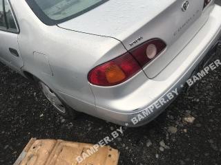 фонарь крышки багажника левый Toyota Corolla 8 поколение (E110) [рестайлинг] 2001, бензин, седан