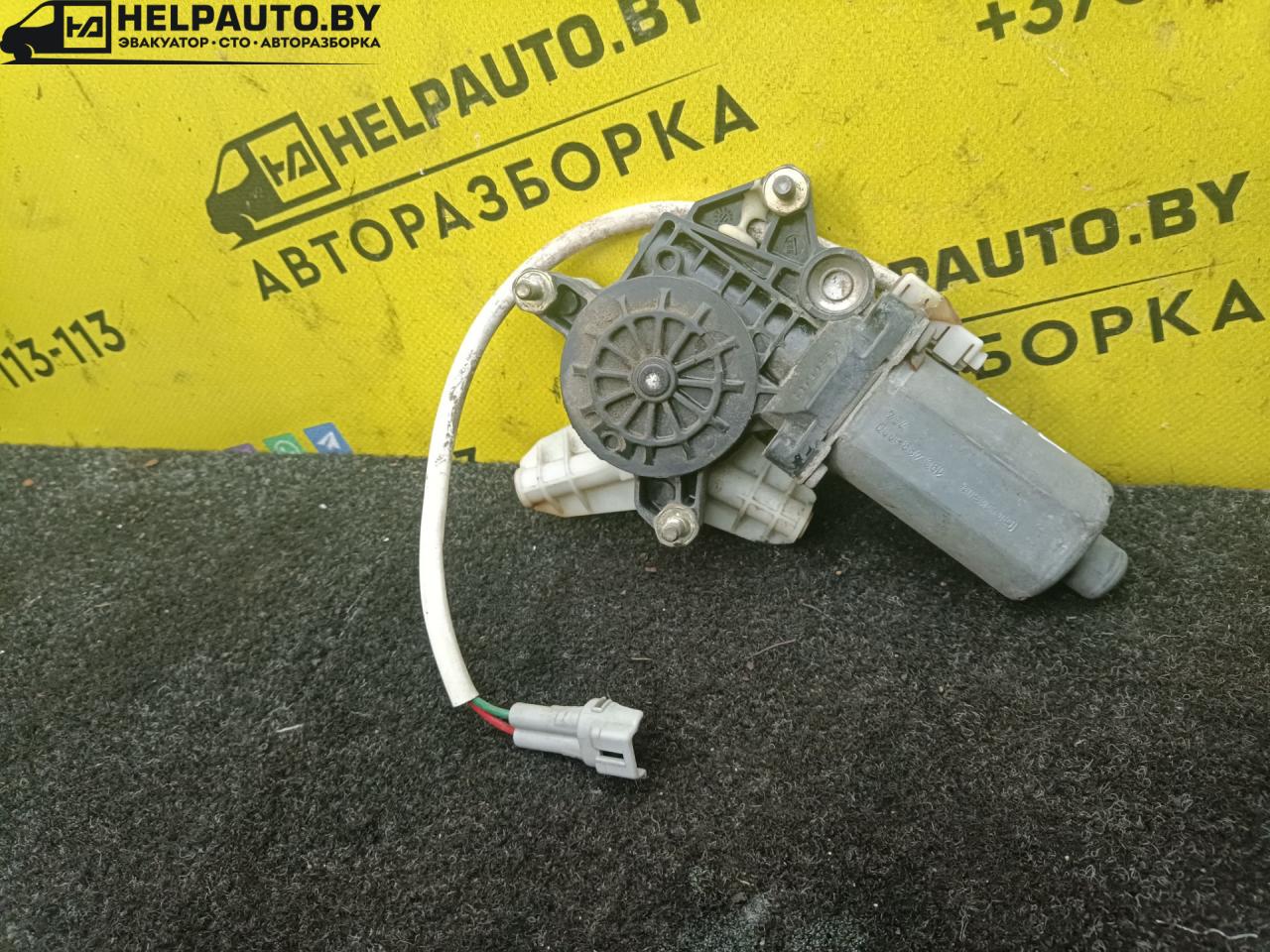 моторчик стеклоподъемника задний левый Toyota Carina E 1 поколение T190 1997, 1.8 л., бензин, МКПП, хетчбэк 5 дв., передний привод, 7A-FE - фото №1