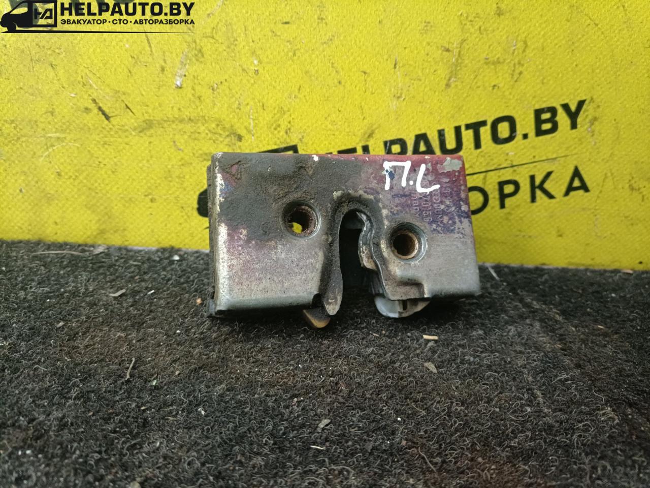 замок двери передней левой Audi 100 С3 1985, 1.9 л., бензин, МКПП, седан, передний привод - фото №1
