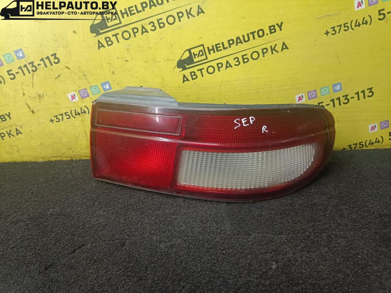 фонарь задний правый Kia Sephia 1 поколение 1993, 1.5 л., бензин, МКПП, белый, седан - фото №1