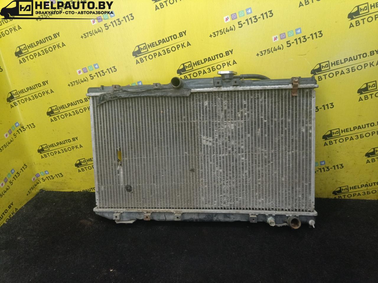 радиатор (основной) Toyota Carina E 1 поколение 1997, 2.0 л., дизель, МКПП, зеленый, седан - фото №1