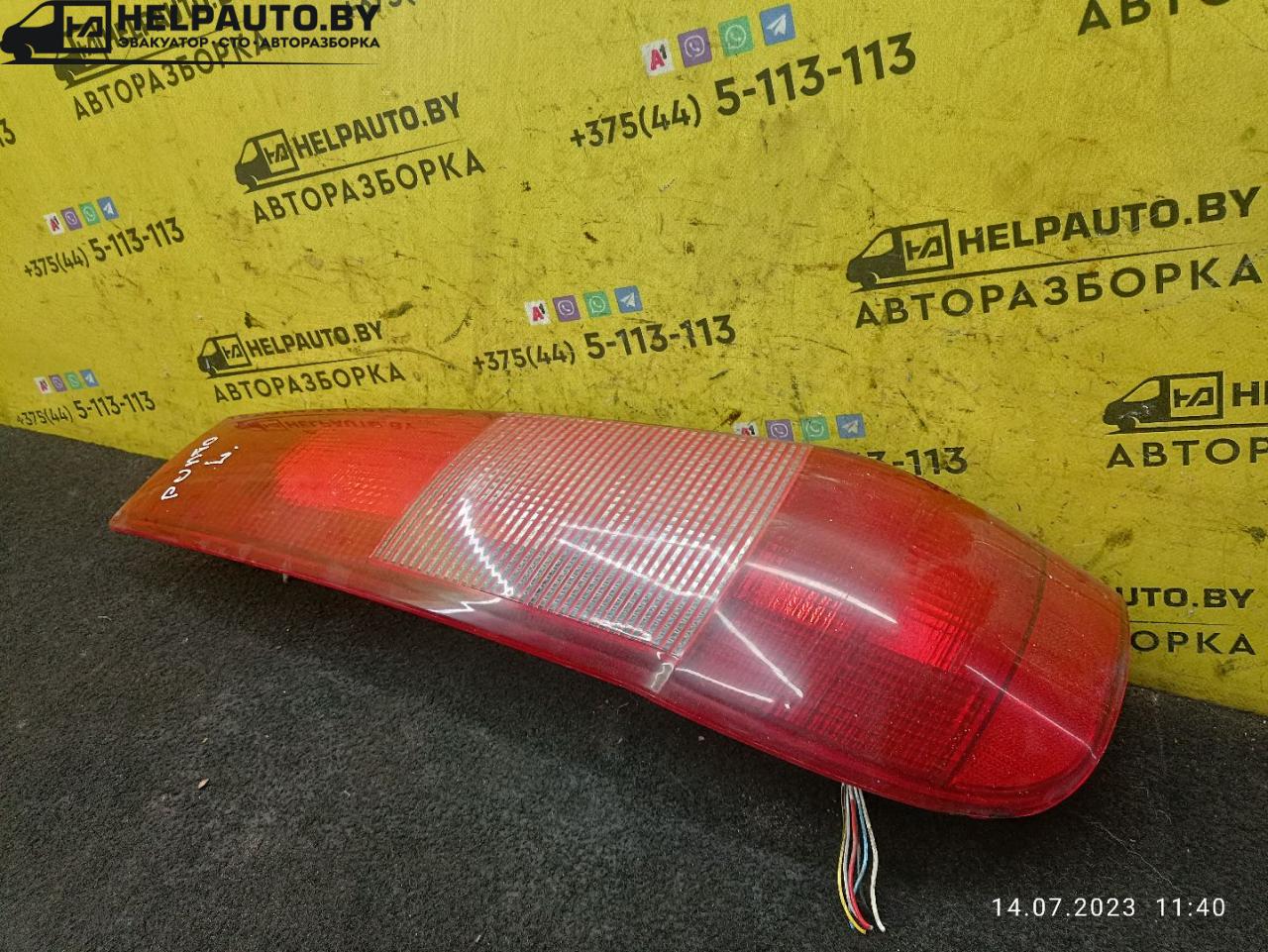 фонарь задний левый Fiat Punto 1 поколение 1997, 1.2 л., бензин, МКПП, белый, хетчбэк 5 дв. - фото №1