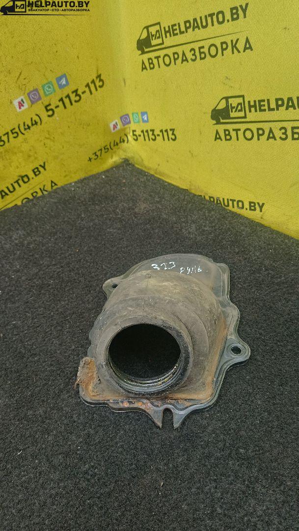 кожух рулевой колонки Mazda 323 6 поколение 1998, 2.0 л., дизель, МКПП, синий, хетчбэк 3 дв. - фото №1