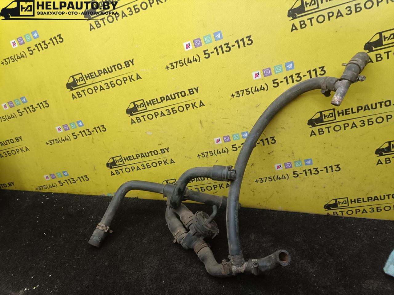патрубок отопителя (печки) Opel Omega B 1997, 2.5 л., X 25 DT, дизель, МКПП, черный, универсал - фото №1