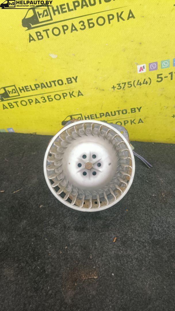 моторчик печки Daewoo Nexia 1 поколение 2000, 1.5 л., G15MF, бензин, МКПП, красныц, хетчбэк 5 дв., передний привод - фото №1
