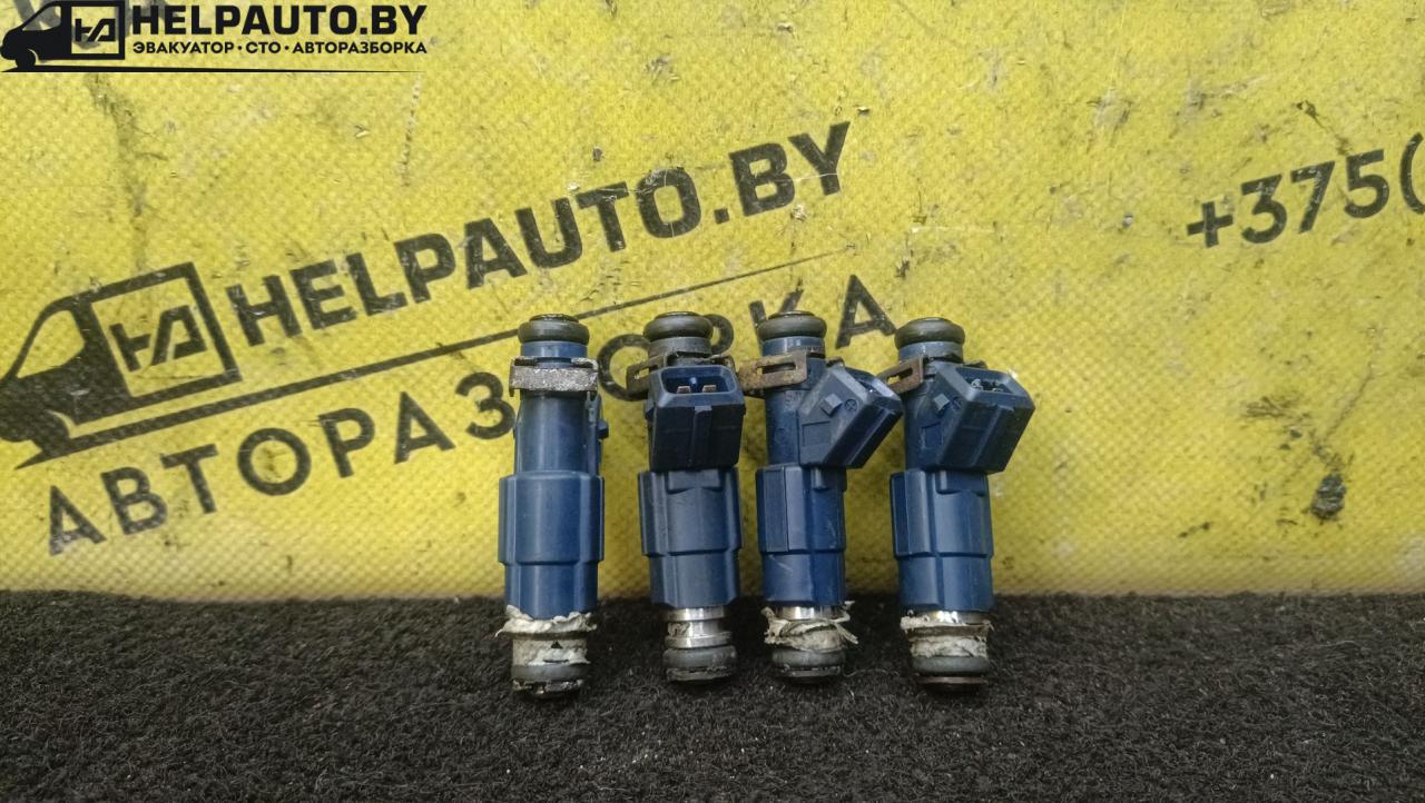 форсунка Opel Sintra 1 поколение 1999, 2.2 л., X 22 XE, бензин, МКПП, белый, минивэн, передний привод - фото №1