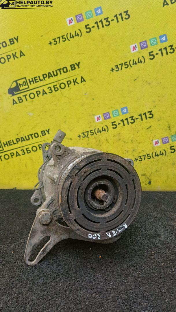 компрессор кондиционера Rover 200 Series 3 поколение 1999, 1.4 л., 14 K2F, бензин, 5МКПП, серебристый, хетчбэк 3 дв., передний привод - фото №1