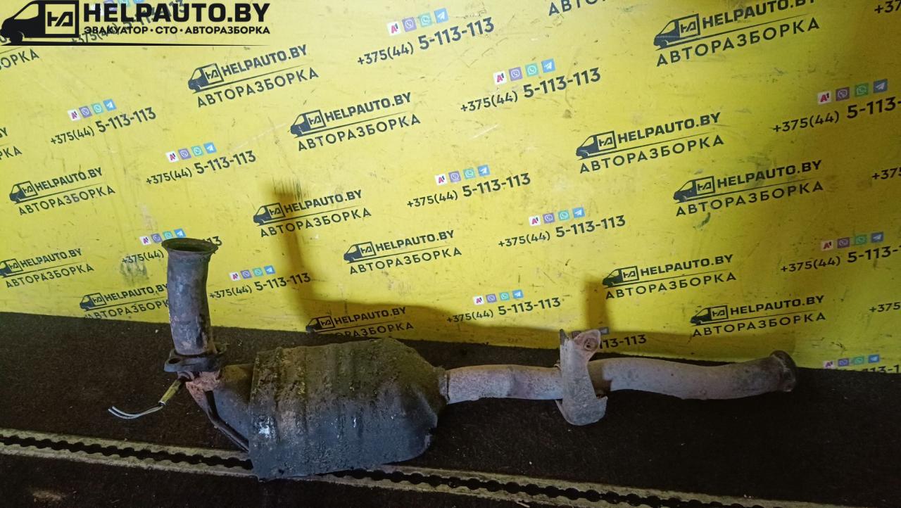труба приемная глушителя Renault Megane 1 поколение 1996, 1.6 л., бензин, МКПП, черный, хетчбэк 5 дв., передний привод - фото №1