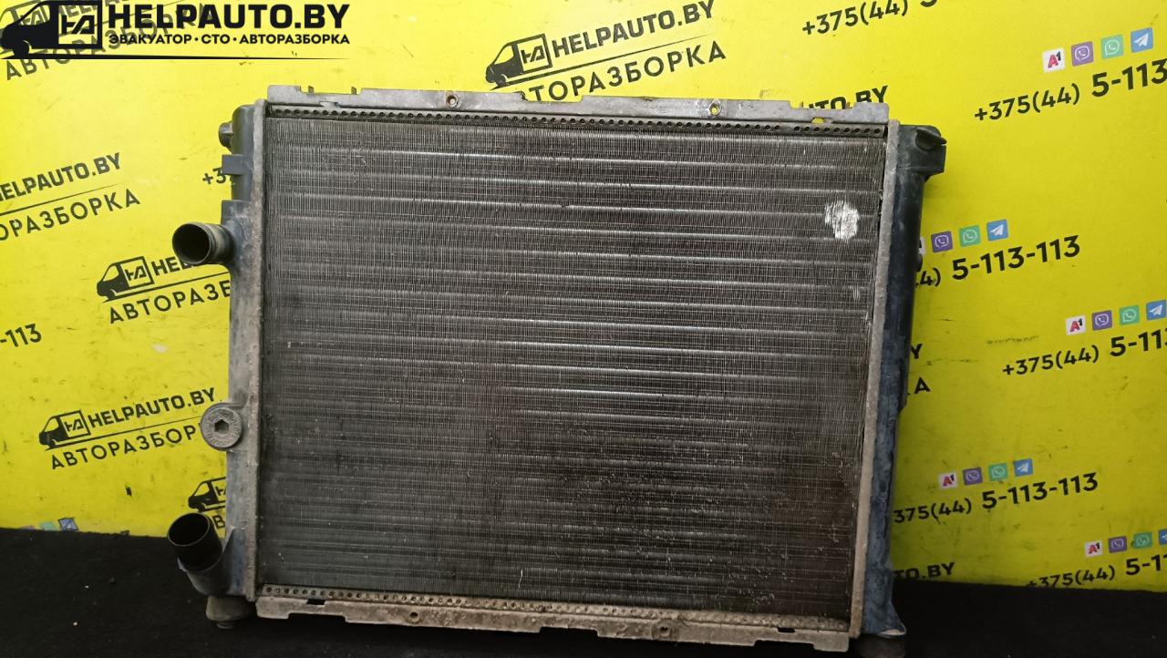 радиатор (основной) Renault Clio 2 поколение 1998, 1.2 л., бензин, золотистый, хетчбэк 3 дв., передний привод - фото №1