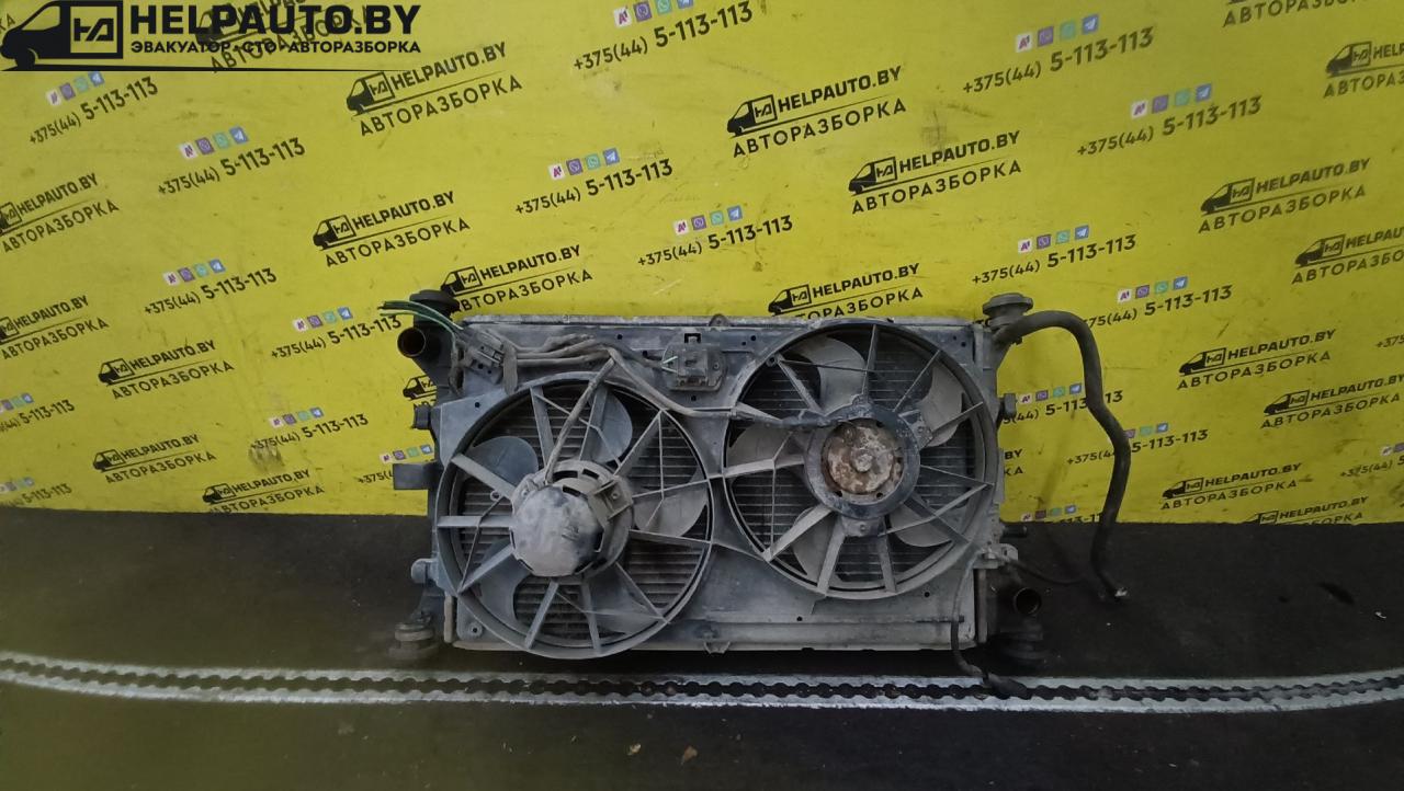 вентилятор радиатора Ford Focus 1 поколение 2001, 1.8 л., дизель, МКПП, синий, универсал, передний привод - фото №1