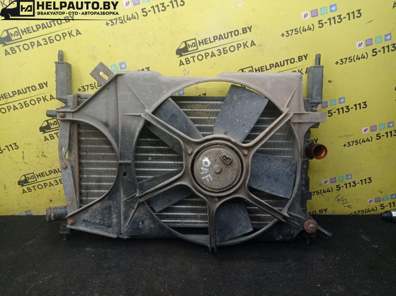 вентилятор радиатора Opel Astra F 1992, 1.4 л., C 14 NZ, бензин, МКПП, красный, хетчбэк 5 дв., передний привод - фото №1