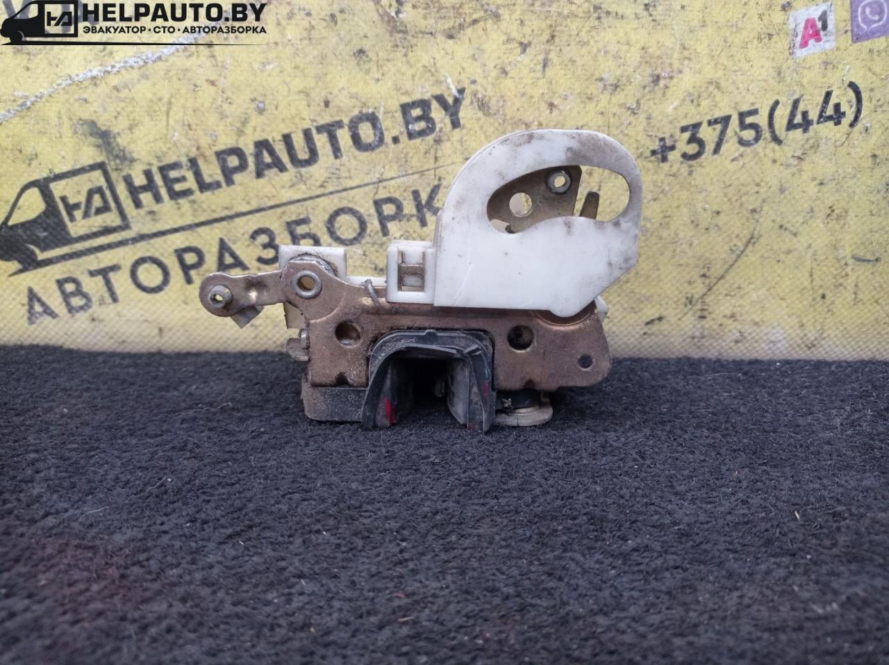 замок двери передней левой Opel Astra F 1992, 1.4 л., C 14 NZ, бензин, МКПП, красный, хетчбэк 5 дв., передний привод - фото №1